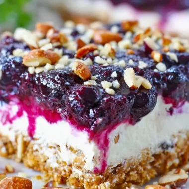 Delicious Blueberry Pretzel Salad with layers of blueberries and pretzel crust