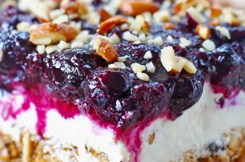 Delicious Blueberry Pretzel Salad with layers of blueberries and pretzel crust