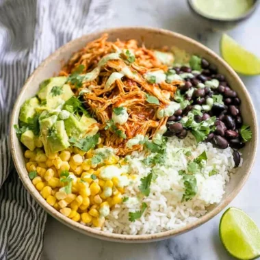 Delicious Chicken Burrito Bowl with rice, beans, and fresh toppings