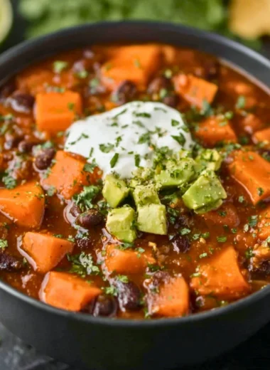 Bowl of Crock Pot Sweet Potato Black Bean Chili garnished with cilantro