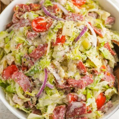 Italian Grinder Salad with fresh veggies and meats, chopped and ready to serve.