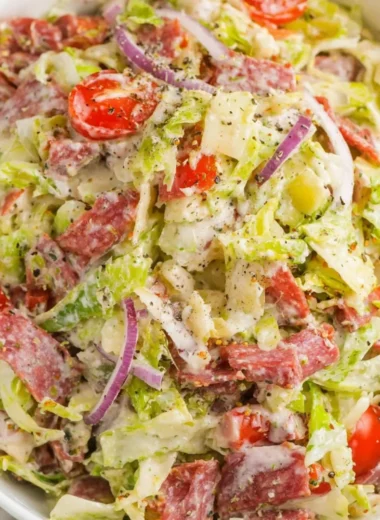 Italian Grinder Salad with fresh veggies and meats, chopped and ready to serve.