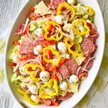 Delicious Italian Sub Salad with fresh vegetables and meats in two styles.