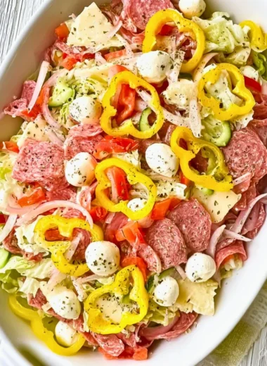 Delicious Italian Sub Salad with fresh vegetables and meats in two styles.