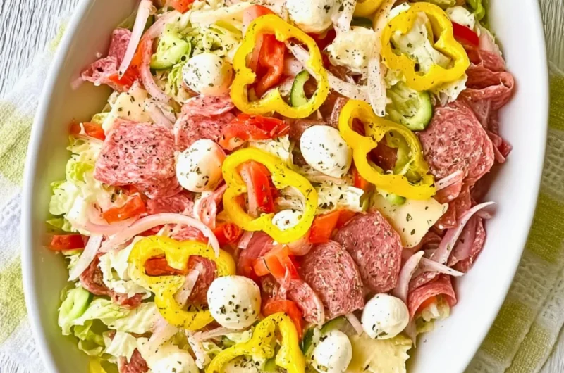 Delicious Italian Sub Salad with fresh vegetables and meats in two styles.