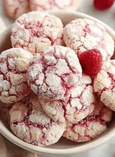 Delicious Raspberry Sugar Cookies beautifully decorated and ready to enjoy