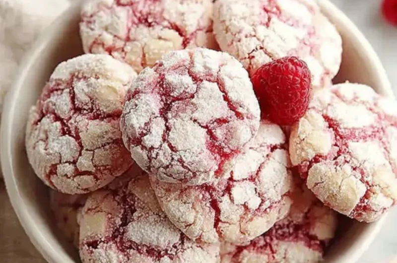 Delicious Raspberry Sugar Cookies beautifully decorated and ready to enjoy