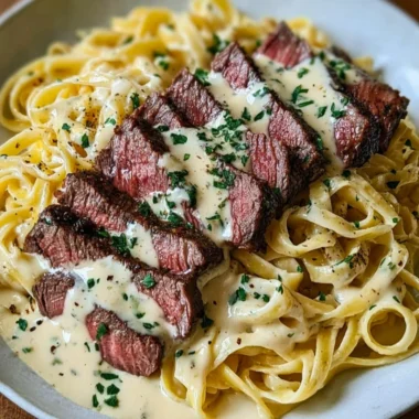 Delicious Steak Gorgonzola Alfredo served with creamy parmesan sauce
