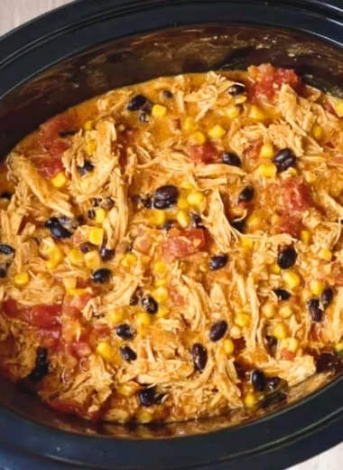 Delicious Southwest Crock Pot Chicken and Rice dish prepared in a slow cooker.