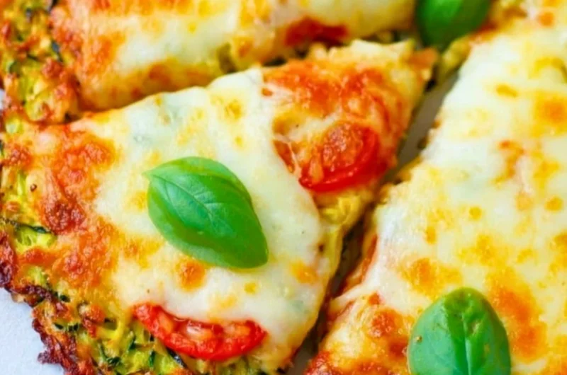 Zucchini pizza crust topped with fresh ingredients and cheese