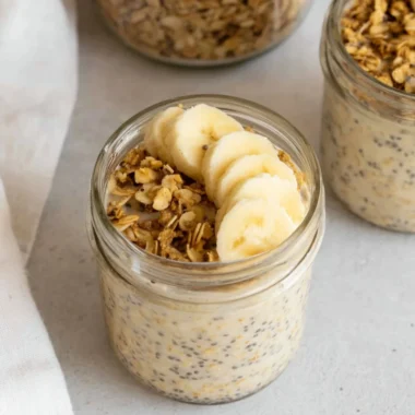 Bowl of brown sugar overnight oats topped with fresh fruit and nuts