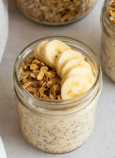 Bowl of brown sugar overnight oats topped with fresh fruit and nuts