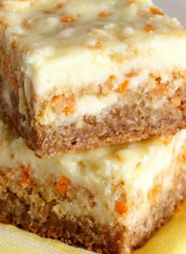 Delicious homemade carrot cake bars topped with creamy frosting