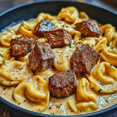Creamy Cracked Garlic Steak Tortellini served with a rich sauce