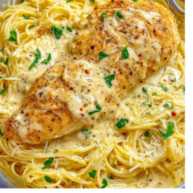 Crock Pot Angel Chicken served on a plate with vegetables