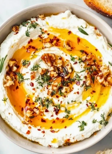 Delicious ricotta dip with hot honey served in a bowl