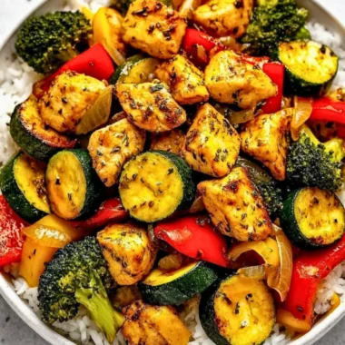 Healthy chicken skillet with seasoned vegetables ready to serve.