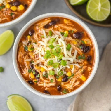 High Protein Chicken Taco Soup served in a bowl with toppings