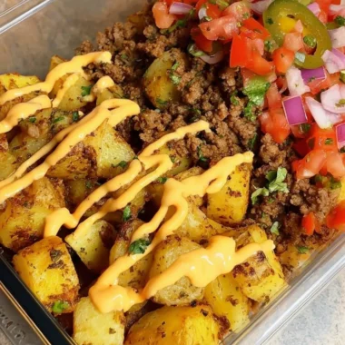 Delicious Loaded Potato Taco Bowl with toppings and fresh ingredients