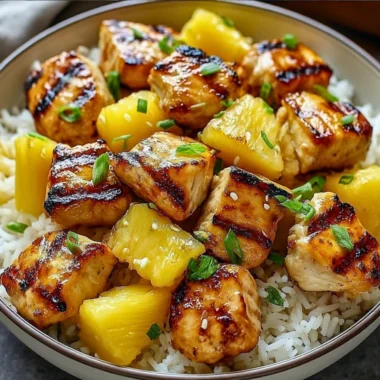 Delicious pineapple chicken served over rice with vibrant colors