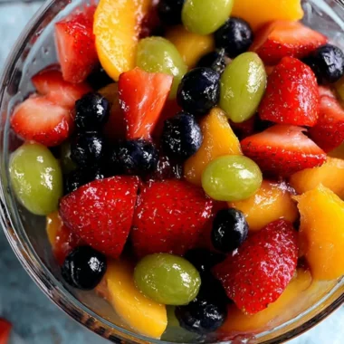 Colorful and refreshing secret ingredient fruit salad in a bowl