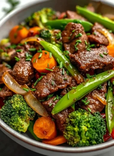Delicious beef stir fry with colorful vegetables served in a bowl