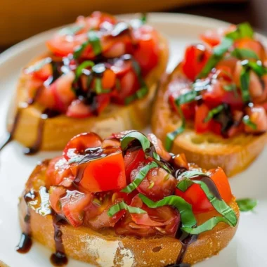 Delicious bruschetta topped with fresh tomatoes and basil on toasted bread.