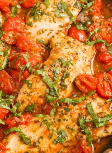 Delicious Chicken Pomodoro with tender chicken and rich tomato sauce served on a plate.