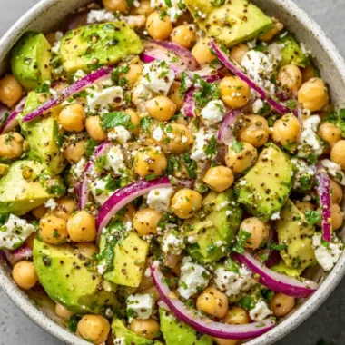 Chickpea Feta Avocado Salad with fresh ingredients in a bowl