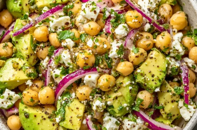 Chickpea Feta Avocado Salad with fresh ingredients in a bowl