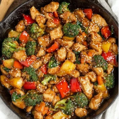Easy chicken stir fry with colorful vegetables in a skillet
