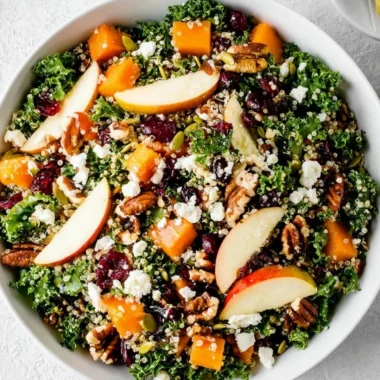 Colorful Healthy Fall Salad with seasonal veggies and nuts on a plate