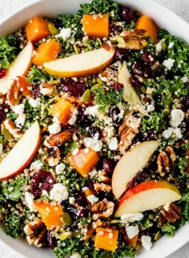 Colorful Healthy Fall Salad with seasonal veggies and nuts on a plate