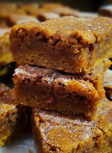 Delicious Pumpkin Snickerdoodle Blondies on a plate ready to enjoy