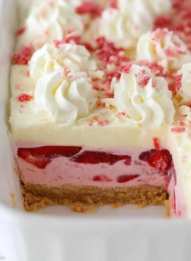 Delicious Strawberry Delight dessert with fresh strawberries and cream