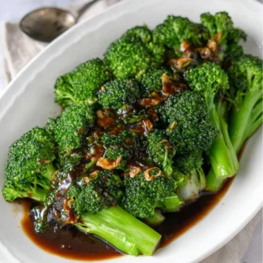 A vibrant dish of broccoli tossed in savory garlic sauce, easy to prepare.