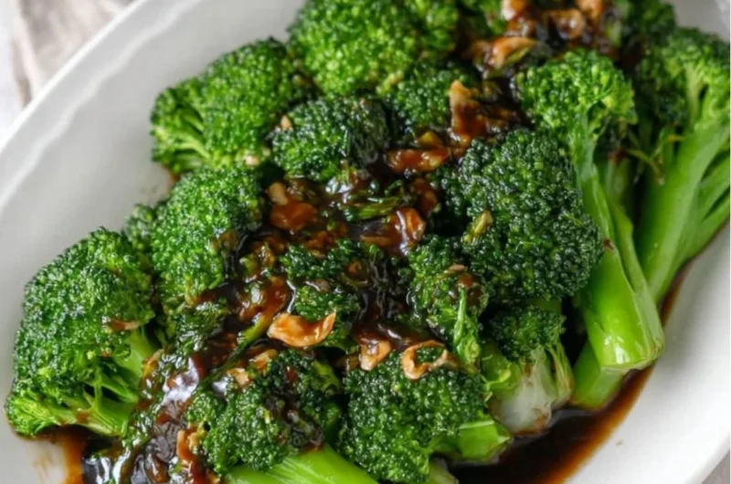 A vibrant dish of broccoli tossed in savory garlic sauce, easy to prepare.