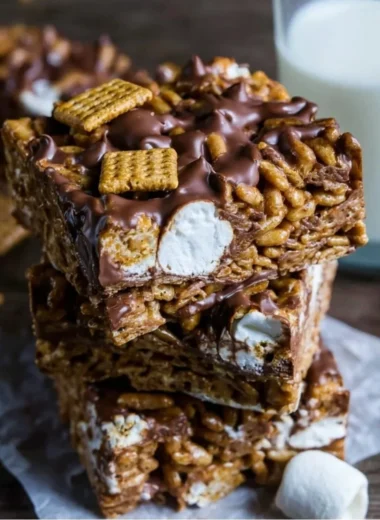 Golden Grahams S'mores Bars stacked in a delicious treat
