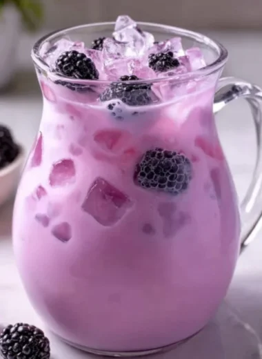 Homemade blackberry coconut pink drink inspired by Starbucks.
