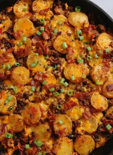 Loaded Ground Beef and Potatoes Skillet served in a pan
