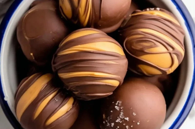 Delicious peanut butter chocolate fat bombs on a plate.