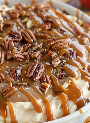 Delicious salted caramel pecan cheesecake dip in a serving bowl.